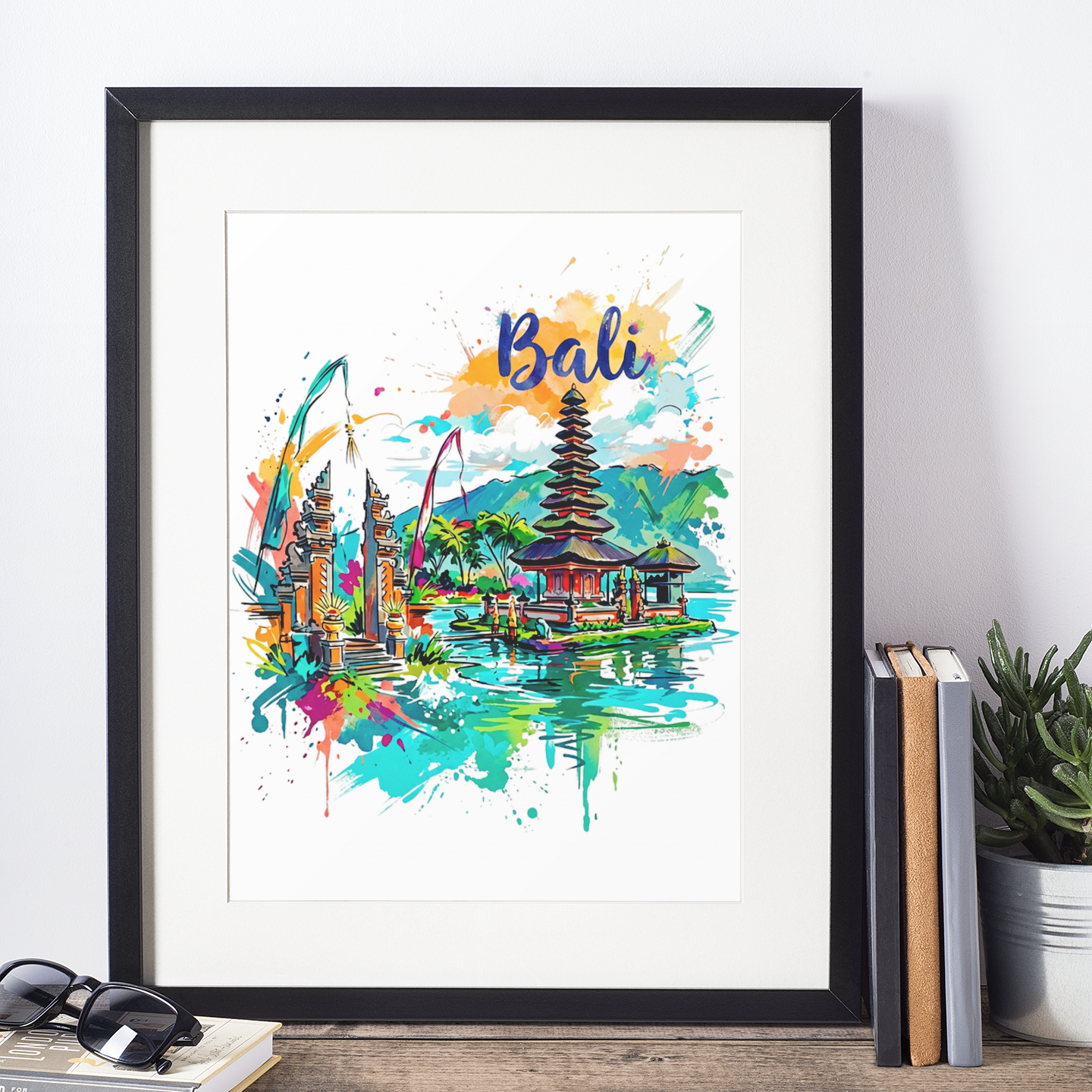 Framed Bali temple landscape art print in black frame, pagoda and colorful splash art
