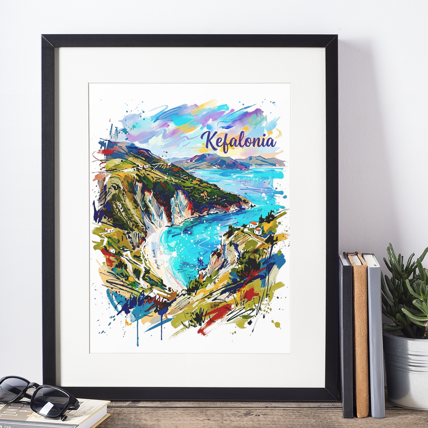 Framed coastal art print with 'Kefalonia' text, watercolor cliffs and turquoise shoreline.